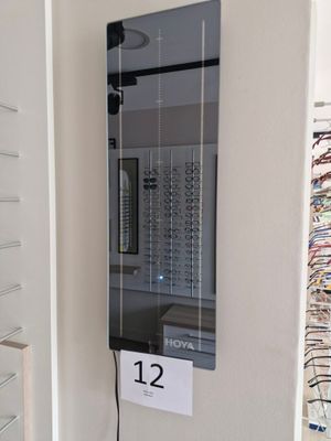 a mirror that is on the wall in the room
