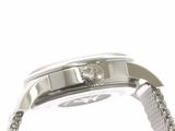 an image of a close up of a watch with a chain around it