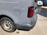 a silver van that is parked in a parking lot