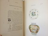 an open book with a picture of a vase on it