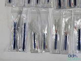 a lot of toothbrushes that are in a bag