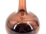 an image of a vase with a reflection of a person in it