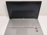 an open laptop computer sitting on top of a white table