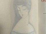 an open book with a drawing of a woman on it