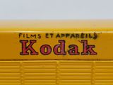 a close up picture of a yellow kodaki truck