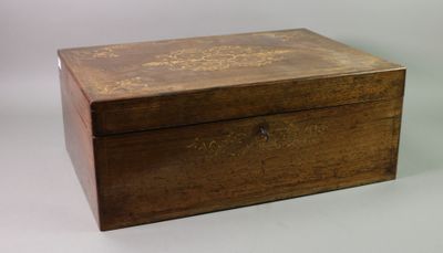 an old wooden box sitting on top of a white table