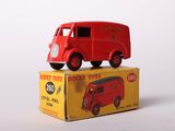 a red toy truck sitting on top of a box