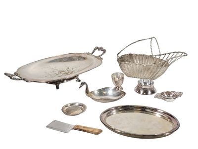a silver plate with a basket on top of it