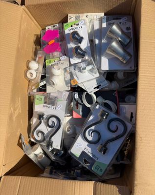 a cardboard box full of assorted items that are in it