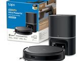 a close up of a box with a remote control and a speaker