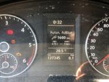 a close up of a car dashboard with various gauges and numbers