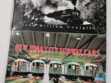 the cover of a book with a picture of a train coming down the tracks