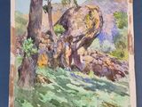 une image représentant un tableau montrant un rocher au milieu d'un champ