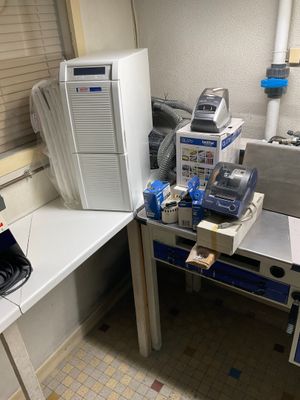 an image of a small room with a lot of clutter