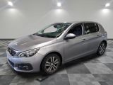 a picture of a silver car parked in a garage