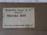 an old label on a piece of paper with a picture of a dog