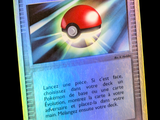a pokemon card with a red poke ball on it