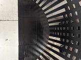 a black chair that is sitting in a room