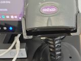a laptop computer sitting on a desk with a mouse and a mouse pad