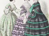 an old fashion book with a picture of a woman in a green dress and three other women in pink dresses