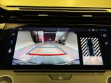 a picture of a car ' s rear view camera on the dashboard