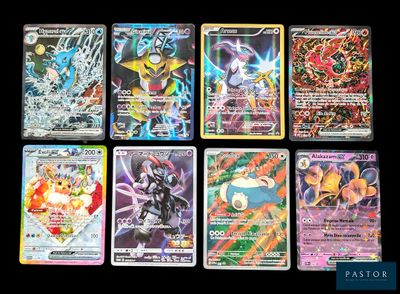 pokemon cards are lined up on a black surface