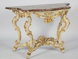 une image d'une table avec un plateau en marbre