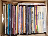 a box full of books that are sitting on a table