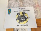 une carte postale sur laquelle figurent deux soldats