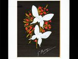 tableau représentant une fleur blanche entourée de fleurs rouges, dans un cadre noir
