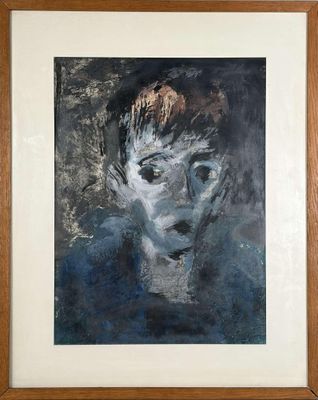 une image représentant un tableau représentant le visage d'un homme, dans un cadre en bois