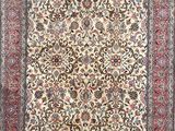 an oriental rug with a floral design on a white background