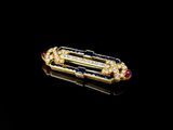a gold, sapphire and diamond broochle