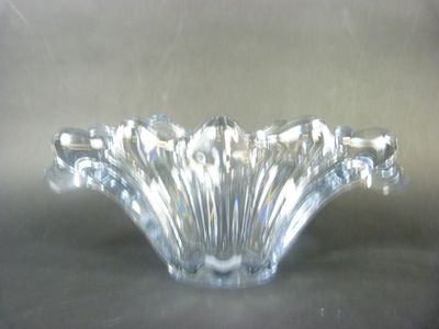 a glass bowl that is sitting on a table
