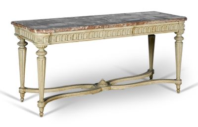 une table avec un plateau en marbre sur fond blanc