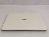 an open laptop computer sitting on top of a white table