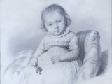 portrait of a little girl holding a teddy bear in a chair