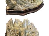 pair of carved jade sculptures of a mountain and a river
