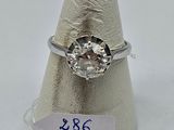 an image of a diamond ring with a price tag on it