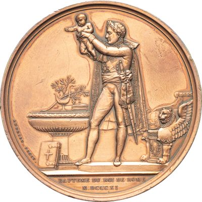 une image représentant une médaille de bronze sur laquelle figure un homme tenant un bébé dans ses bras