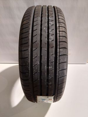 a close up of a tire on a white surface