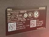 the back panel of a dell laptop with a qr code on it