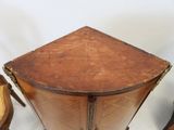 a small table with a wooden top and a chair next to it