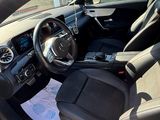 the interior of a car with a steering wheel and dashboard