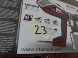 a picture of a picture of a red and black electric hand held nail dryer
