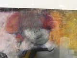 une photo d'une photo d'un chien portant un chapeau de clown