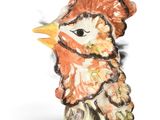 a figurine of a chicken on a white background
