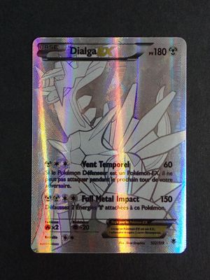 a close up of a pokemon card on a table