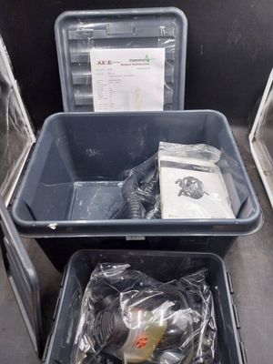 two bins that are sitting next to each other on the floor