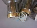 three light bulbs that are sitting next to each other
